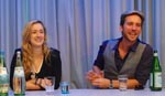 Ashley Johnson og Troy Baker, der lægger stemme til Ellie og Joel.